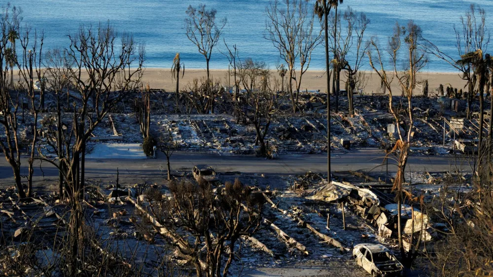 FILE PHOTO: The charred remains of a trailer park along the beach are pictured, following the Palisades Fire at the Pacific Palisades neighborhood in Los Angeles, California, U.S. January 15, 2025. REUTERS/Mike Blake/File Photo