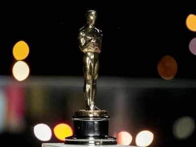 FILE PHOTO: An Oscars statuette on display at a screening of the Oscars in Paris, France April 26, 2021. Lewis Joly/Pool via REUTERS/File Photo