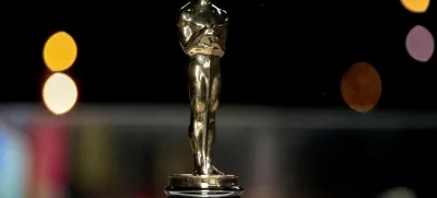 FILE PHOTO: An Oscars statuette on display at a screening of the Oscars in Paris, France April 26, 2021. Lewis Joly/Pool via REUTERS/File Photo