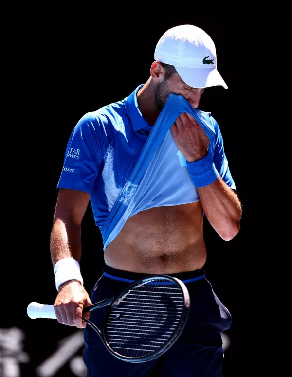 Tennis - Australian Open - Melbourne Park, Melbourne, Australia - January 24, 2025 Serbia's Novak Djokovic reacts during his semi final match against Germany's Alexander Zverev REUTERS/Edgar Su