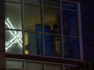 'X' logo is seen reflected on an apartment window across the street from the headquarters of the messaging platform X, formerly known as Twitter, in downtown San Francisco, California, U.S., July 30, 2023. REUTERS/Carlos Barria   TPX IMAGES OF THE DAY