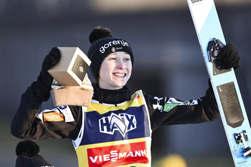 Slovenia's Nika Prevc celebrates after winning the Women's Individual HS140 competition at the ski jumping world cup in Lillehammer, Norway, Saturday, Nov. 23, 2024 (Geir Olsen/NTB Scanpix via AP)