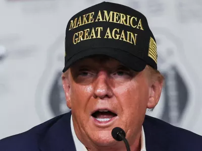 U.S. President Donald Trump speaks during a briefing on wildfire damage as he visits the Pacific Palisades neighborhood that was damaged by the Palisades Fire, in Los Angeles, California, U.S., January 24, 2025. REUTERS/Leah Millis