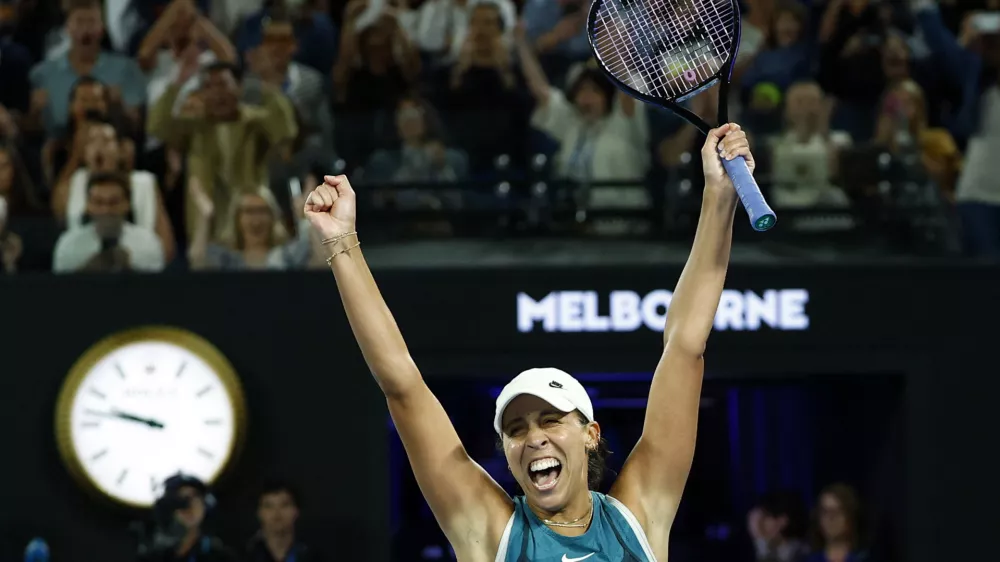 Tennis - Australian Open - Melbourne Park, Melbourne, Australia - January 25, 2025 Madison Keys of the U.S. celebrates after winning the final against Belarus' Aryna Sabalenka REUTERS/Kim Kyung-Hoon