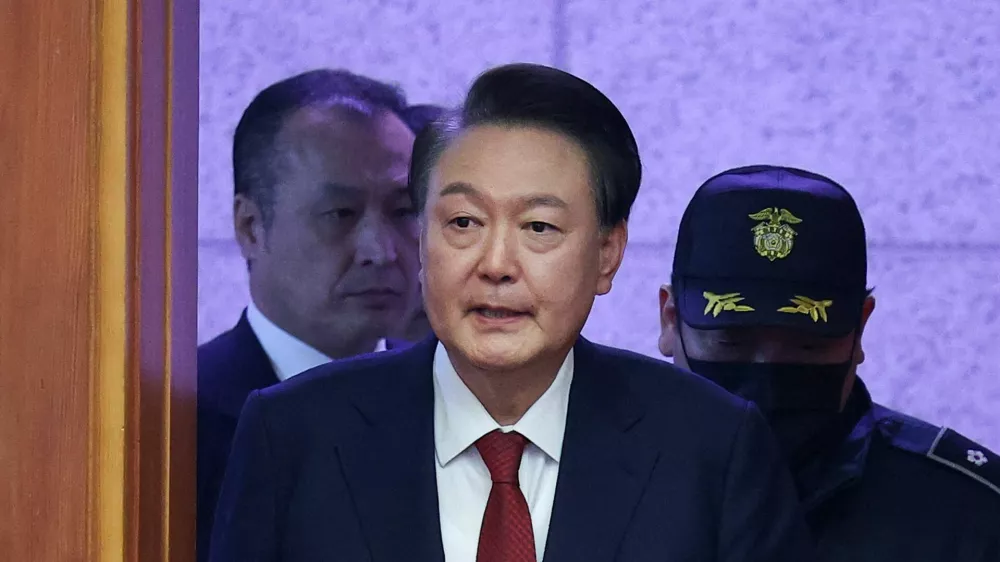 FILE PHOTO: South Korea's impeached President Yoon Suk Yeol arrives for his impeachment trial at the Constitutional Court in Seoul, South Korea, January 21, 2025. REUTERS/Kim Hong-Ji/Pool/File Photo