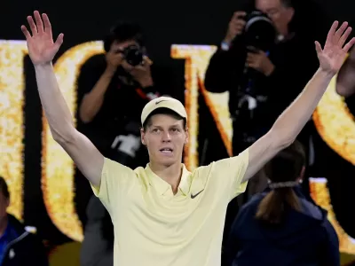 Jannik Sinner of Italy celebrates after defeating Alexander Zverev of Germany in the men's singles final at the Australian Open tennis championship in Melbourne, Australia, Sunday, Jan. 26, 2025. (AP Photo/Asanka Brendon Ratnayake)