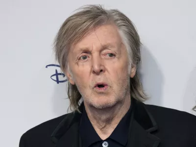 FILE - Paul McCartney and Nancy Shevell pose for photographers upon arrival for the premiere of the film 'If These Walls Could Sing' in London, Monday, Dec. 12, 2022. (Photo by Scott Garfitt/Invision/AP, File)