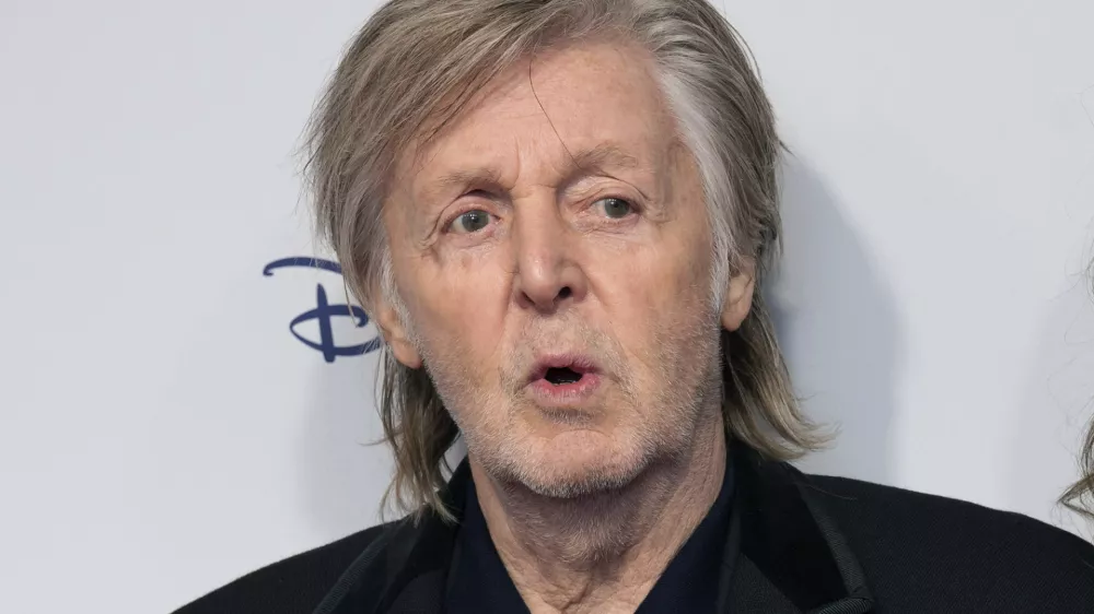 FILE - Paul McCartney and Nancy Shevell pose for photographers upon arrival for the premiere of the film 'If These Walls Could Sing' in London, Monday, Dec. 12, 2022. (Photo by Scott Garfitt/Invision/AP, File)