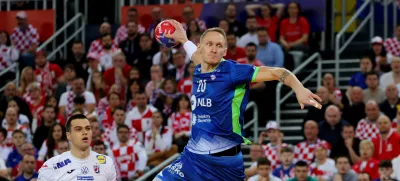 Handball - IHF Handball World Championships 2025 - Main Round IV - Croatia v Slovenia - Zagreb Arena, Zagreb, Croatia - January 26, 2025 Slovenia's Tilen Kodrin scores a goal REUTERS/Antonio Bronic