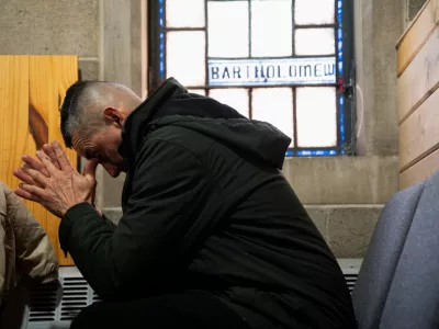 A man attends a service at Starting Point Community Church, which assists members of the newly arrived migrant community, amid concerns of intensified immigration enforcement by U.S. Immigration and Customs Enforcement (ICE) after the inauguration of U.S. President Donald Trump, in Chicago, Illinois U.S. January 26, 2025. REUTERS/Vincent Alban