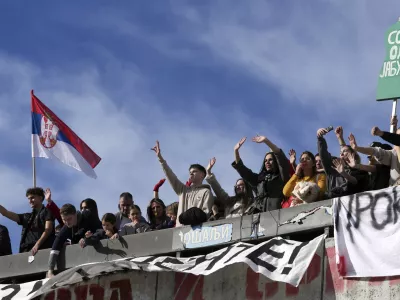 Students during a student-led 24 hour block on an intersection to protest the deaths of 15 people killed in the November collapse of a train station canopy, in Belgrade, Serbia, Monday, Jan. 27, 2025. (AP Photo/Darko Vojinovic)