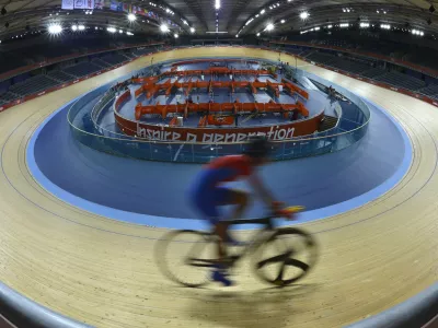 A member of the Cuban track cycling team trains at the Velodrome at the Olympic Park in Stratford, the location of the London 2012 Olympic Games, in east London July 20, 2012. REUTERS/Toby Melville (BRITAIN - Tags: SPORT CYCLING OLYMPICS)