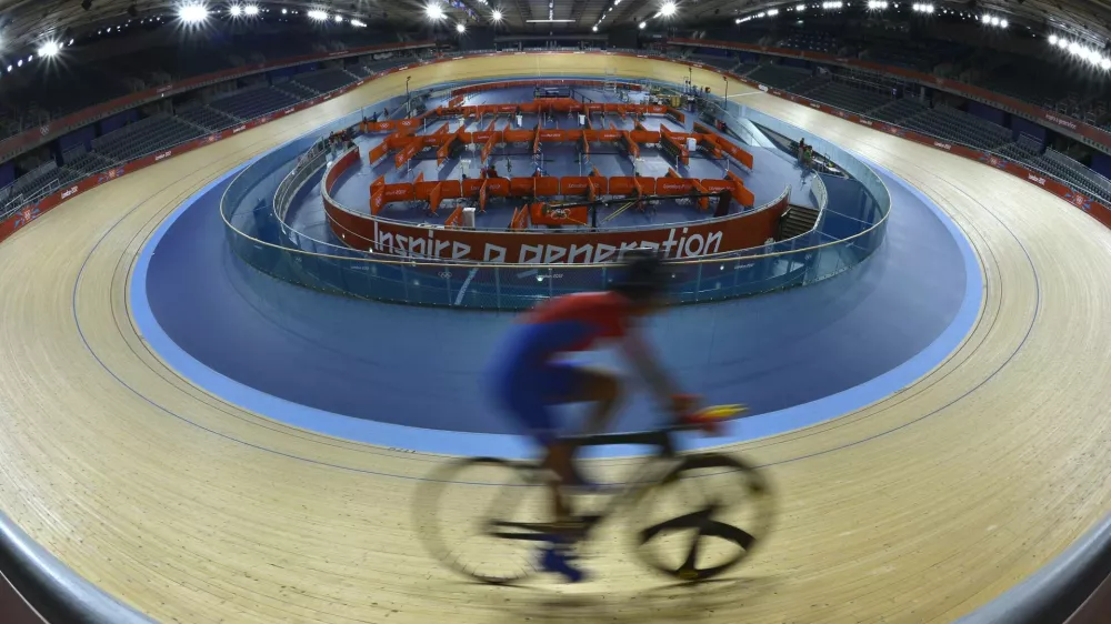 A member of the Cuban track cycling team trains at the Velodrome at the Olympic Park in Stratford, the location of the London 2012 Olympic Games, in east London July 20, 2012. REUTERS/Toby Melville (BRITAIN - Tags: SPORT CYCLING OLYMPICS)