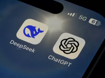 The Icons for the smartphone apps DeepSeek and ChatGPT are seen on a smartphone screen in Beijing, Tuesday, Jan. 28, 2025. (AP Photo/Andy Wong)