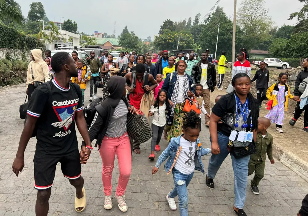 Humanitarian staff flee from Goma, eastern Democratic Republic of Congo, following fighting between M23 rebels and the Armed Forces of the Democratic Republic of the Congo (FARDC), in Gisenyi, Rwanda, January 27, 2025. REUTERS/Stringer