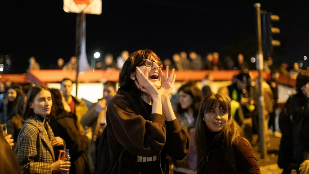 A demonstrator chants slogans as Belgrade University students participate in a 24-hour blockade of a major junction during a protest against what demonstrators claim are government policies, corruption, and negligence blamed for the deaths in the November 2024 Novi Sad railway station disaster, in Belgrade, Serbia, January 27, 2025. REUTERS/Djordje Kojadinovic