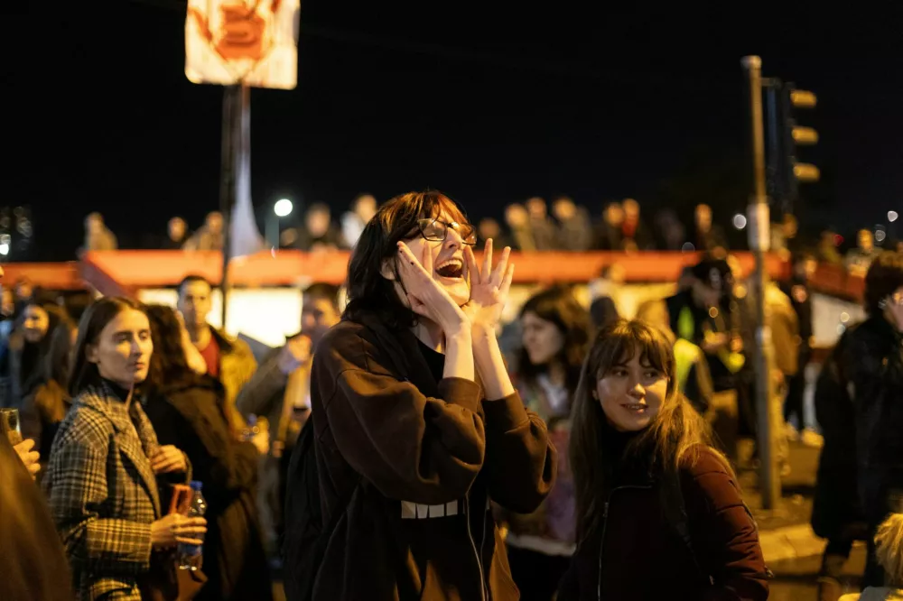 A demonstrator chants slogans as Belgrade University students participate in a 24-hour blockade of a major junction during a protest against what demonstrators claim are government policies, corruption, and negligence blamed for the deaths in the November 2024 Novi Sad railway station disaster, in Belgrade, Serbia, January 27, 2025. REUTERS/Djordje Kojadinovic