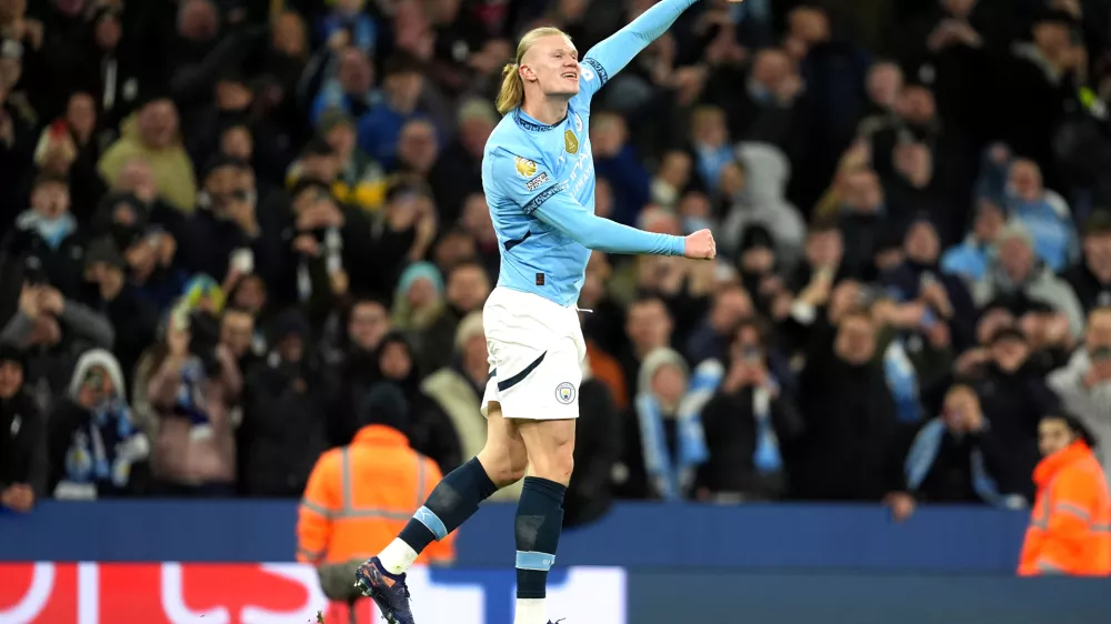 25 January 2025, United Kingdom, Manchester: Manchester City's Erling Haaland celebrates scoring his side's second goal during the English Premier League soccer match between Manchester City and Chelsea at the Etihad Stadium. Photo: Martin Rickett/PA Wire/dpa