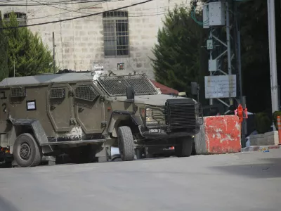 28 January 2025, Palestinian Territories, Tulkarem: Israeli military vehicle pictured on the second day of an Israeli military raid at Tulkarem refugee camp, near the West Bank city of Tulkarem. At least two Palestinians were killed and a dozen injured in the Israeli military raid in Tulkarem and its camp, according to the Palestinian Ministry of Health. Photo: Mohammed Nasser Apaimages/APA Images via ZUMA Press Wire/dpa