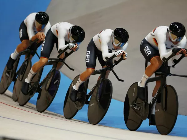 FILE PHOTO: Paris 2024 Olympics - Track Cycling - Men's Team Pursuit, Qualifying - Saint-Quentin-en-Yvelines Velodrome, Montigny-le-Bretonneux, France - August 05, 2024. Theo Reinhardt of Germany in second position with teammates Roger Kluge of Germany, Tim Torn Teutenberg of Germany and Tobias Buck-Gramcko of Germany. REUTERS/Agustin Marcarian/File Photo