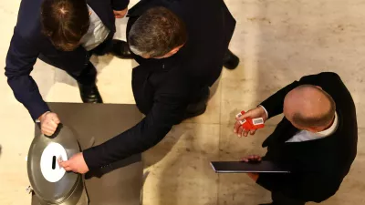 German Chancellor Olaf Scholz takes part in a vote, after the attacks in Magdeburg and Aschaffenburg, in Berlin, Germany, January 29, 2025. REUTERS/Liesa Johannssen