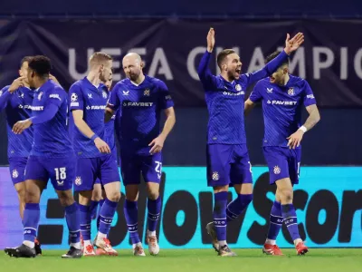 Soccer Football - Champions League - GNK Dinamo Zagreb v AC Milan - Stadion Maksimir, Zagreb, Croatia - January 29, 2025 GNK Dinamo Zagreb's Marko Pjaca celebrates scoring their second goal with teammates REUTERS/Antonio Bronic