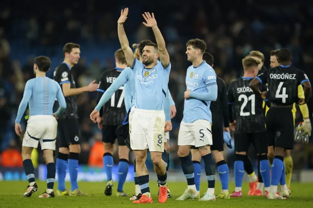 Manchester City's Mateo Kovacic celebrates after the Champions League opening phase soccer match between Manchester City and Club Brugge at the Etihad Stadium in Manchester, Wednesday, Jan. 29, 2025. (AP Photo/Dave Thompson)