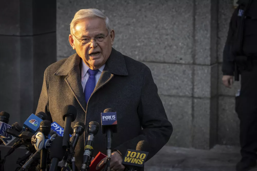 Former Sen. Bob Menendez, D-N.J., speaks to reporters outside federal court in New York, Wednesday, Jan. 29, 2025. (AP Photo/Stefan Jeremiah)