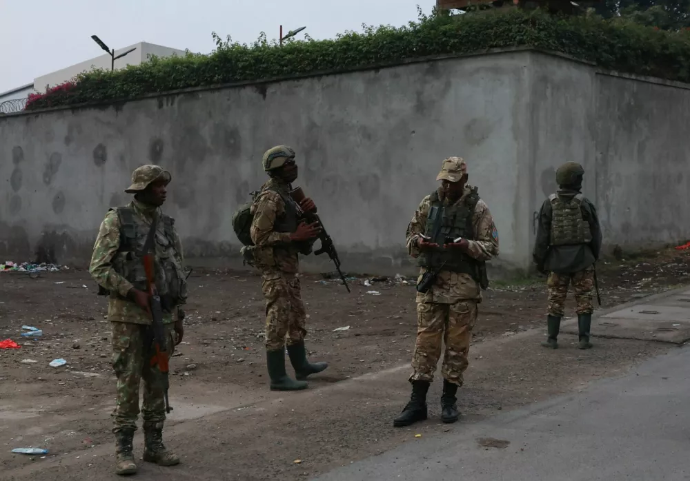 M23 rebel group spokesman Willy Ngoma stands guard at their position, amid clashes between them and the Armed Forces of the Democratic Republic of the Congo (FARDC), in Goma, eastern Democratic Republic of the Congo, January 29, 2025. REUTERS/Stringer