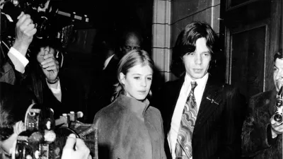 FILE - Mick Jagger, lead singer of The Rolling Stones, and singer Marianne Faithfull appear at Marlborough St. Court for possession of marijuana, in London, England, June 23, 1969. (AP Photo/Eddie Worth, File)