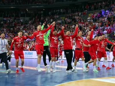 Handball - IHF Handball World Championships 2025 - Semi Final - France v Croatia - Zagreb Arena, Zagreb, Croatia - January 30, 2025 Croatia players celebrate winning their semi final match REUTERS/Antonio Bronic