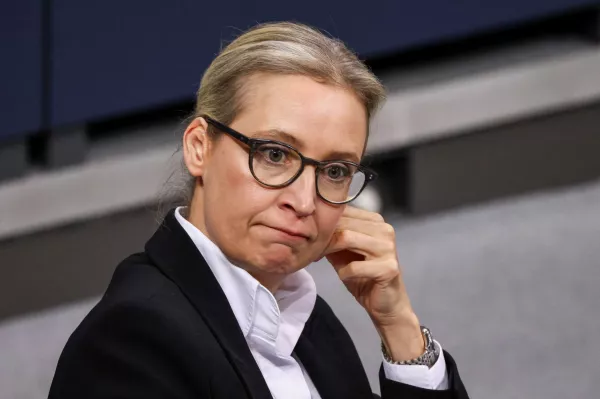 Co-leader of the Alternative for Germany party (AfD) Alice Weidel looks on as she attends a session of the lower house of parliament Bundestag, after Christian Democratic Party (CDU) party leader Friedrich Merz succeeded on Wednesday in getting a motion passed in parliament that calls for a migration crackdown, including the rejection of asylum seekers at the country's land borders, in Berlin, Germany, January 31, 2025. REUTERS/Liesa Johannssen   TPX IMAGES OF THE DAY