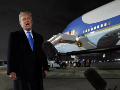 U.S. President Donald Trump speaks to reporters after stepping from Air Force One upon his return to Washington, at Joint Base Andrews in Maryland, U.S., February 2, 2025. REUTERS/Kevin Lamarque