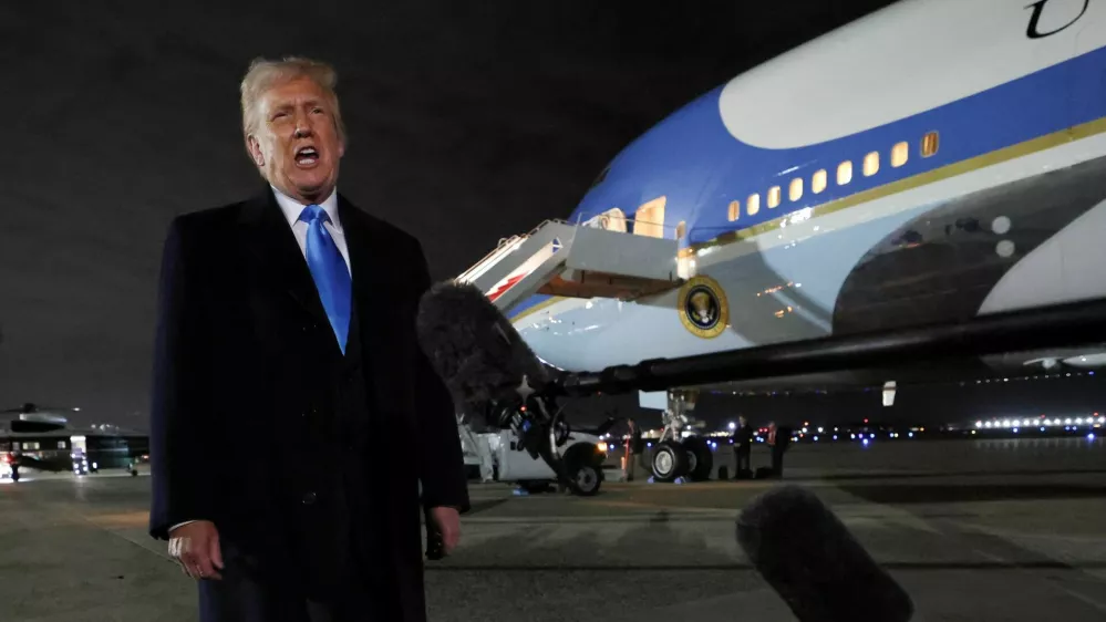 U.S. President Donald Trump speaks to reporters after stepping from Air Force One upon his return to Washington, at Joint Base Andrews in Maryland, U.S., February 2, 2025. REUTERS/Kevin Lamarque