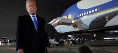 U.S. President Donald Trump speaks to reporters after stepping from Air Force One upon his return to Washington, at Joint Base Andrews in Maryland, U.S., February 2, 2025. REUTERS/Kevin Lamarque