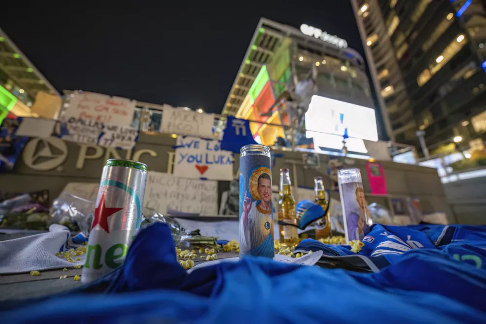 Feb 2, 2025; Dallas, Texas, USA; Dallas Mavericks fans leave notes and memorabilia after the game between the Dallas Stars and the Columbus Blue Jackets at American Airlines Center to protest the trade of Mavericks point guard Luka Doncic to the Los Angeles Lakers. Mandatory Credit: Jerome Miron-Imagn Images