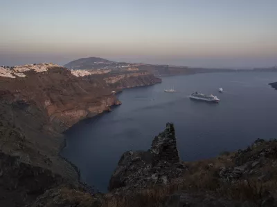 FILE - Ruins of a settlement, including a former Catholic monastery, lie on the rocky promontory of Skaros on the Greek island of Santorini, on June 15, 2022. (AP Photo/Petros Giannakouris, File)