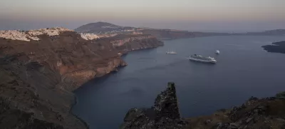 FILE - Ruins of a settlement, including a former Catholic monastery, lie on the rocky promontory of Skaros on the Greek island of Santorini, on June 15, 2022. (AP Photo/Petros Giannakouris, File)