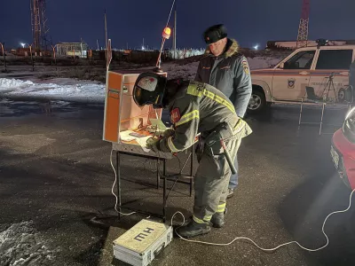 In this photo released by Governor of the Saratov region Roman Busargin telegram channel on Wednesday, Jan. 8, 2025, Firefighters and rescuers work at the industrial side damaged after Ukrainian drones' attack in Saratov, Russia. (Governor of the Saratov region Roman Busargin telegram channel via AP)