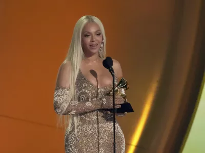 Beyonce accepts the award for best country album for "COWBOY CARTER" during the 67th annual Grammy Awards on Sunday, Feb. 2, 2025, in Los Angeles. (AP Photo/Chris Pizzello)