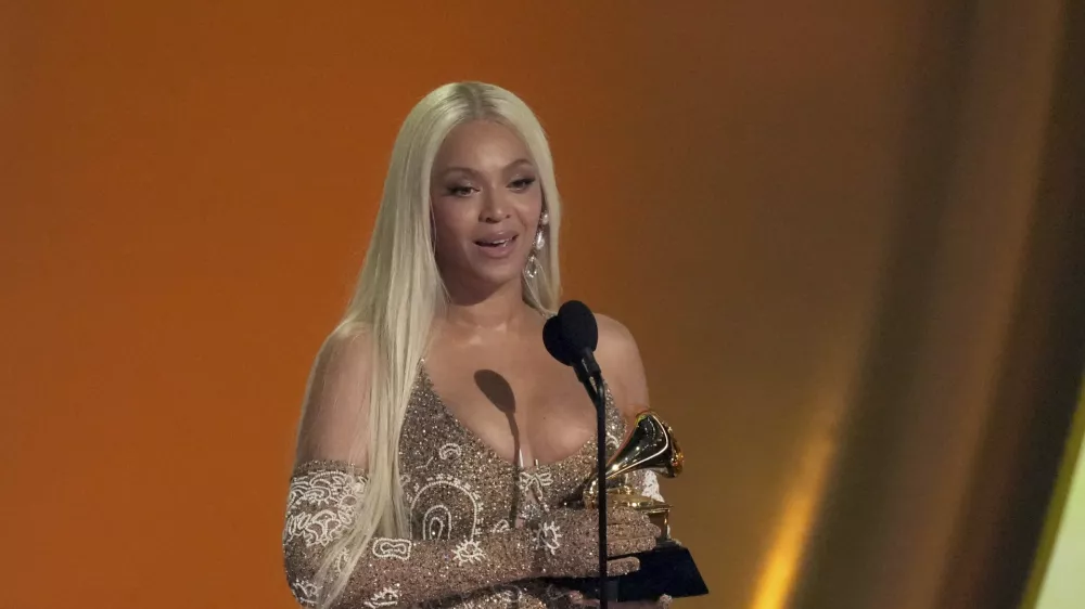 Beyonce accepts the award for best country album for "COWBOY CARTER" during the 67th annual Grammy Awards on Sunday, Feb. 2, 2025, in Los Angeles. (AP Photo/Chris Pizzello)