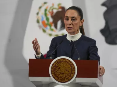 Mexican President Claudia Sheinbaum gives her daily morning press conference at the National Palace in Mexico City, Monday, Feb. 3, 2025. (AP Photo/Marco Ugarte)