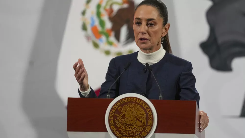 Mexican President Claudia Sheinbaum gives her daily morning press conference at the National Palace in Mexico City, Monday, Feb. 3, 2025. (AP Photo/Marco Ugarte)