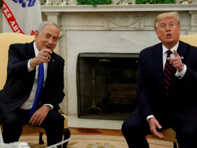 FILE PHOTO: Israel's Prime Minister Benjamin Netanyahu meets with U.S. President Donald Trump prior to signing the Abraham Accords, normalizing relations between Israel and some of its Middle East neighbors in a strategic realignment of Middle Eastern countries against Iran, during a meeting in the Oval Office at the White House in Washington, U.S., September 15, 2020. REUTERS/Tom Brenner/File Photo