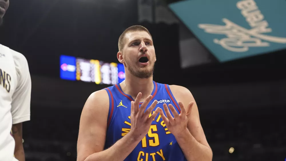 Denver Nuggets center Nikola Jokic argues for a call in the first half of an NBA basketball game against the New Orleans Pelicans, Monday, Feb. 3, 2025, in Denver. (AP Photo/David Zalubowski)