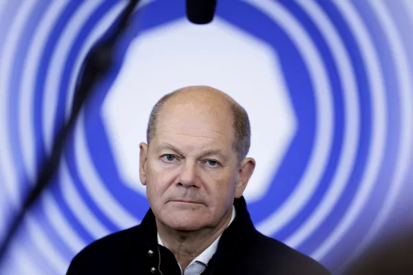 Germany's Chancellor Olaf Scholz speaks with the media at the European Council building after an EU summit in Brussels, Monday, Feb. 3, 2025. (AP Photo/Omar Havana)