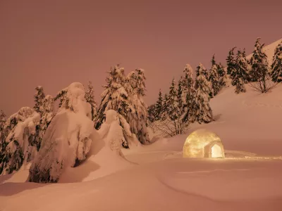 RA5PX9 Winter wonderland with igloo snow. Night scene with snow firs and snowdrift. Landscape in red