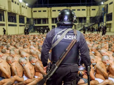 ﻿Gang members are secured during a police operation at Izalco jail during a 24-hour lockdown ordered by El Salvador's President Nayib Bukele in Izalco, El Salvador, photograph released to Reuters by the El Salvador Presidency on April 25, 2020. El Salvador Presidency/Handout via REUTERS ATTENTION EDITORS - THIS IMAGE HAS BEEN SUPPLIED BY A THIRD PARTY. NO RESALES. NO ARCHIVES. THIS IMAGE WAS PROCESSED BY REUTERS TO ENHANCE QUALITY, AN UNPROCESSED VERSION HAS BEEN PROVIDED SEPARATELY.