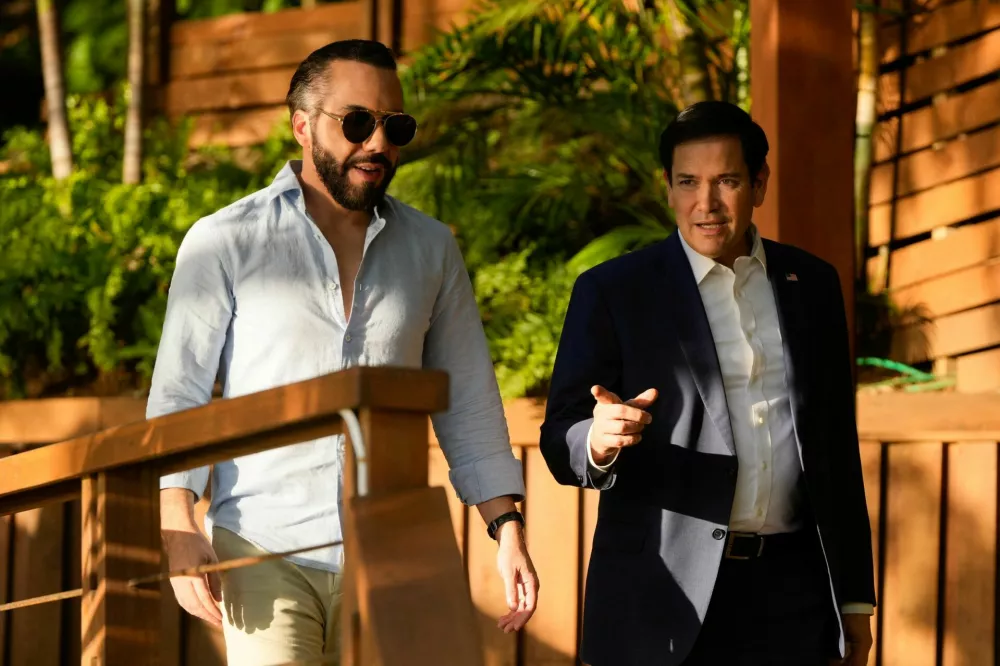 U.S. Secretary of State Marco Rubio meets with El Salvador's President Nayib Bukele at his residence at Lake Coatepeque, El Salvador, Monday, Feb. 3, 2025.   Mark Schiefelbein/Pool via REUTERS