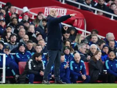 02 February 2025, United Kingdom, London: Manchester City manager Pep Guardiola gestures on the touchline during the English Premier League soccer match between Arsenal and Manchester City at the Emirates Stadium. Photo: Adam Davy/PA Wire/dpa